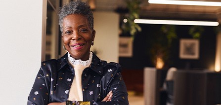 Closeup of senior woman smiling in office