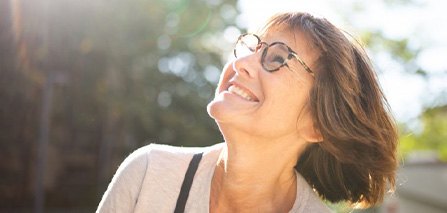 Lady smiles in sunshine