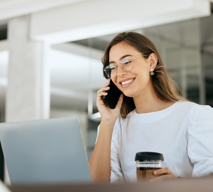 Woman talking on the phone with Putnam dental office