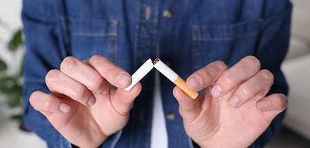 Patient breaking cigarette
