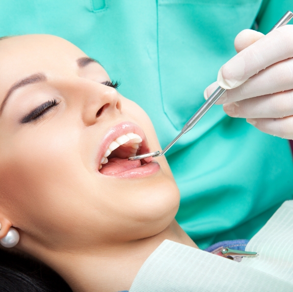 Woman receiving a dental checkup